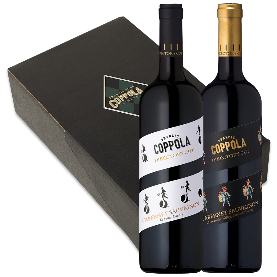 Two bottles of Coppola Director's Cut Cabernet Sauvignon, one with a white label and the other with a black label, stand in front of a black box.