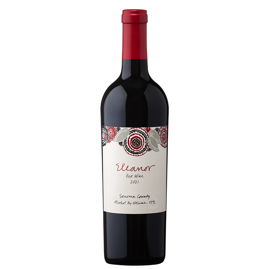 A bottle of red wine labeled "Eleanor" with floral patterns in red and black hues. The label indicates "Red Wine, 2021, Sonoma County."