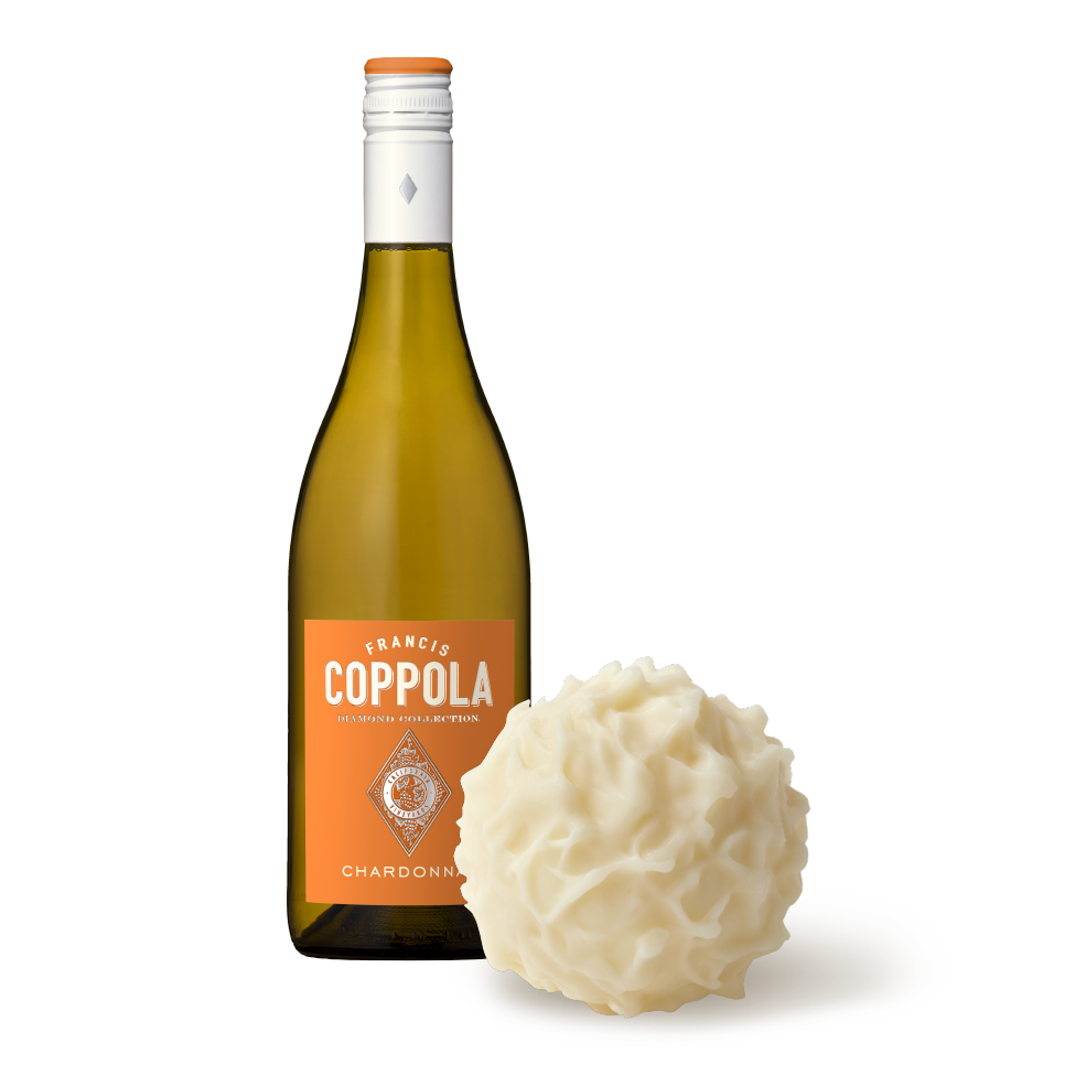 A bottle of Diamond Collection Chardonnay pictured with a Lindt White Chocolate Truffle