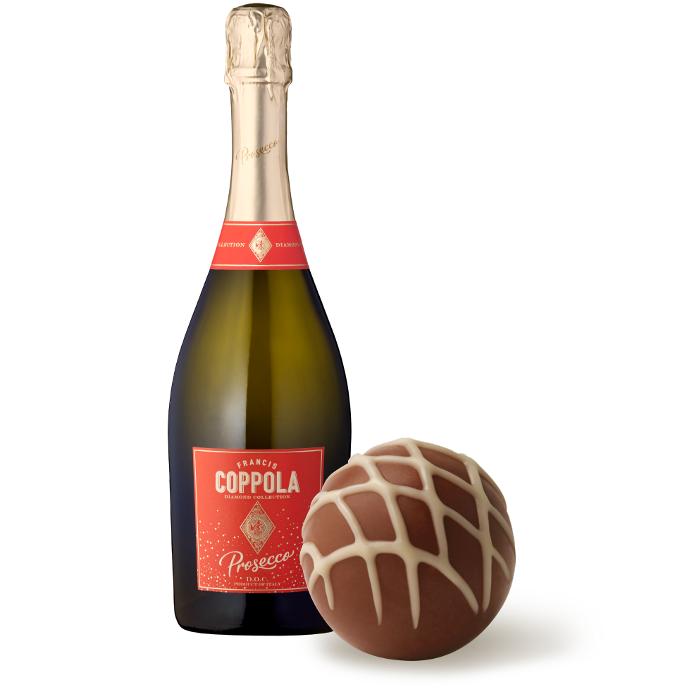 A bottle of Diamond Collection Prosecco pictured with a Lindt Fudge Chocolate Truffle