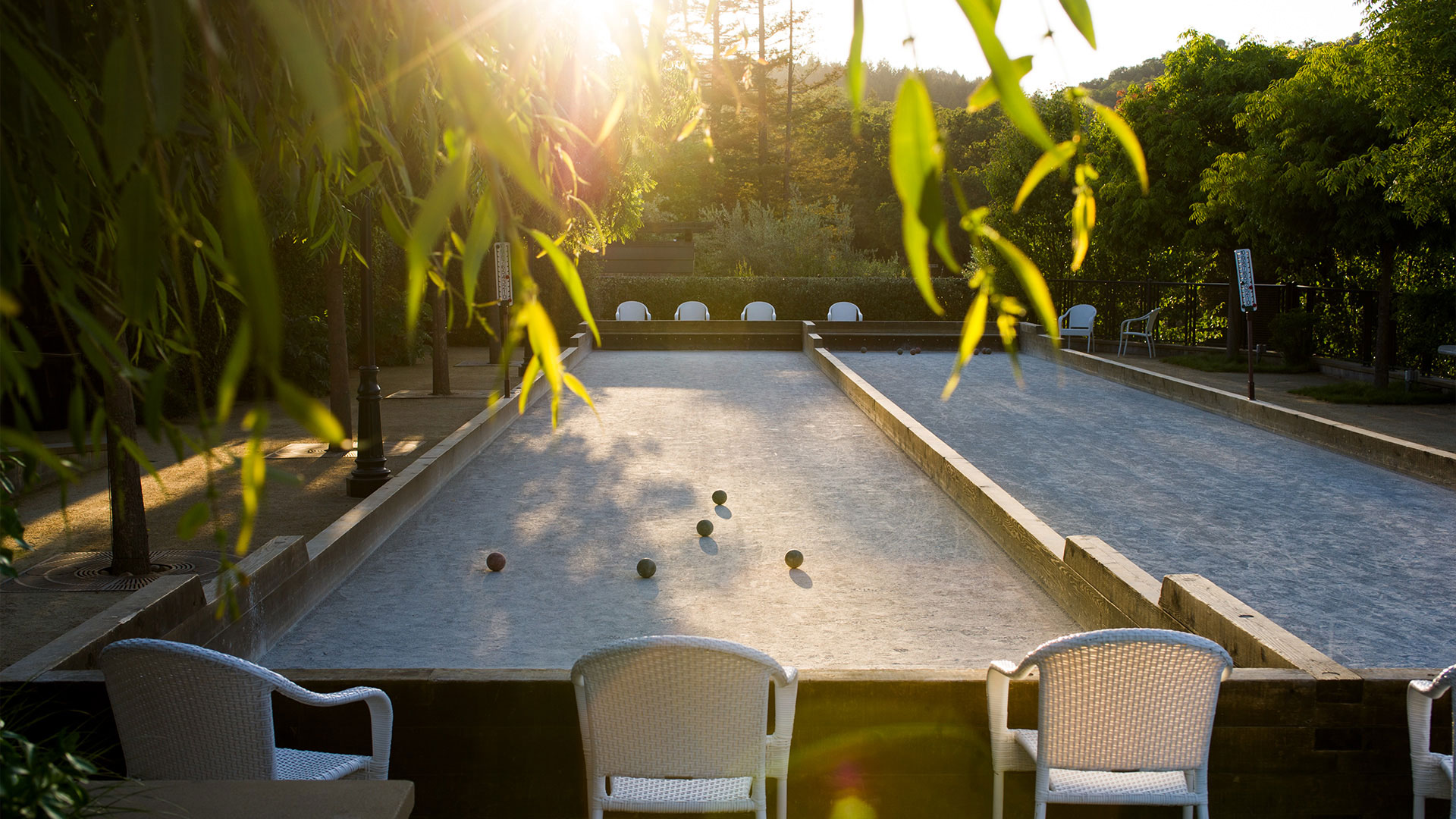 View of a bocce ball court at sunset