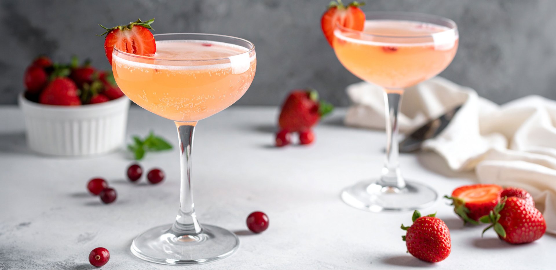 Photo of two White Cranberry Strawberry Fizz cocktails